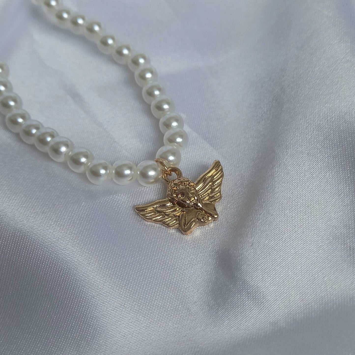 Gold Angel Charm Pearl Necklace - Faux Pearl Necklaces In The UK,Gold Angel Necklace,Angel Jewellery,Gold Jewellery In The UK,Gold Necklace