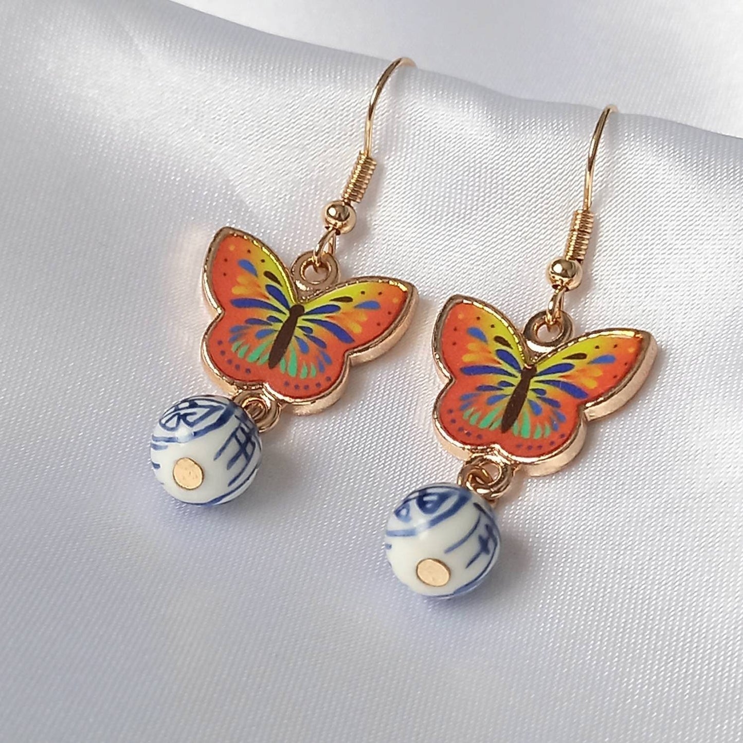 Orange Butterfly Drop Earrings - Lightweight Earrings,Orange Butterfly Earrings,Blue Earrings In The UK,Gold Butterfly Jewellery In The UK