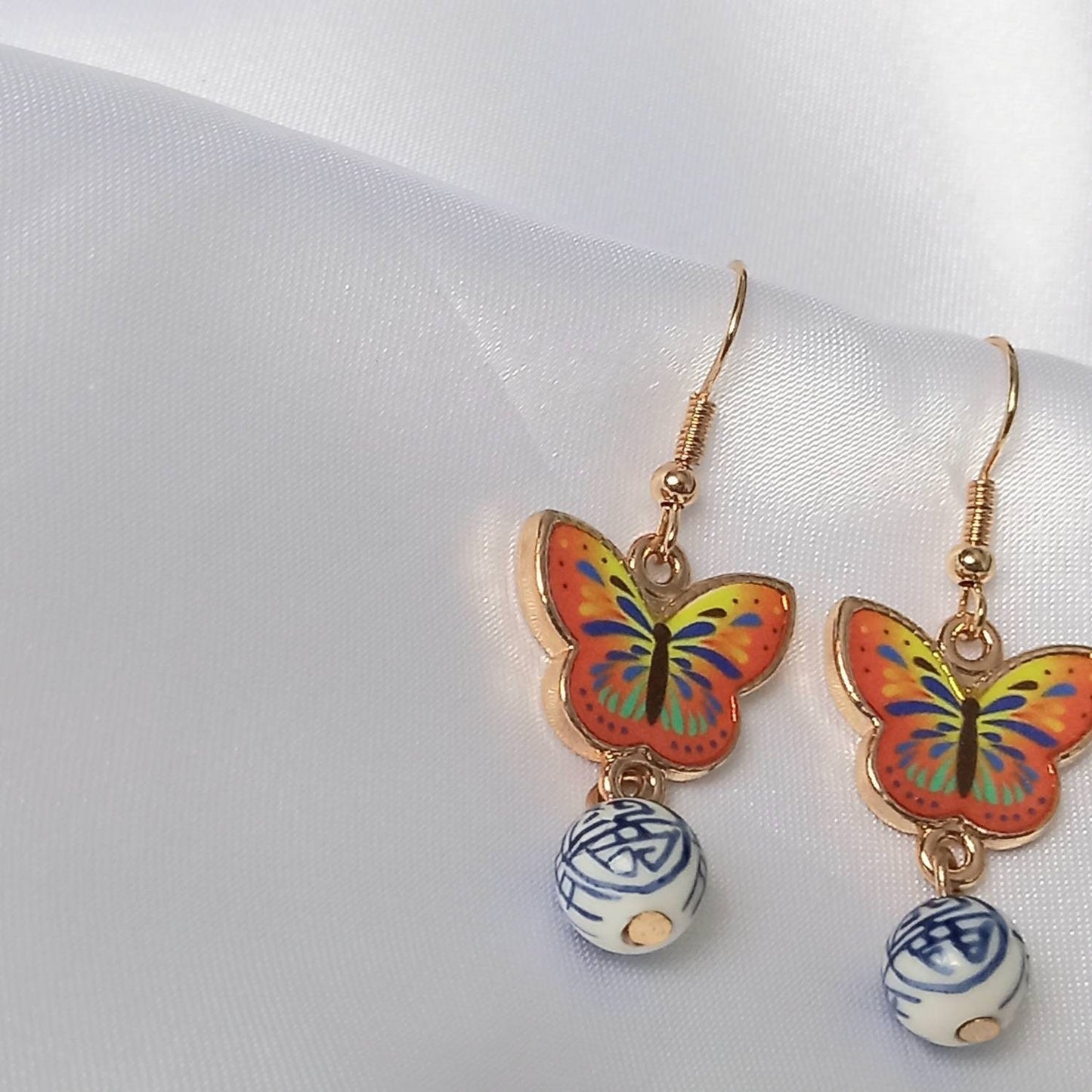 Orange Butterfly Drop Earrings - Lightweight Earrings,Orange Butterfly Earrings,Blue Earrings In The UK,Gold Butterfly Jewellery In The UK