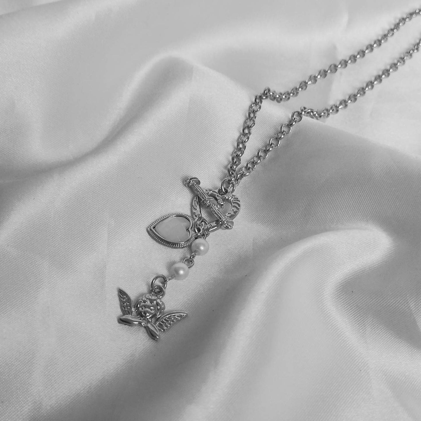 Silver Angel Charm Necklace - Silver Necklaces In The UK,Angel Necklaces,Angel Jewellery,Silver Jewellery In The UK,Silver Heart Necklace