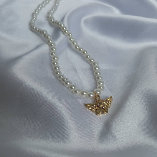 Gold Angel Charm Pearl Necklace - Faux Pearl Necklaces In The UK,Gold Angel Necklace,Angel Jewellery,Gold Jewellery In The UK,Gold Necklace