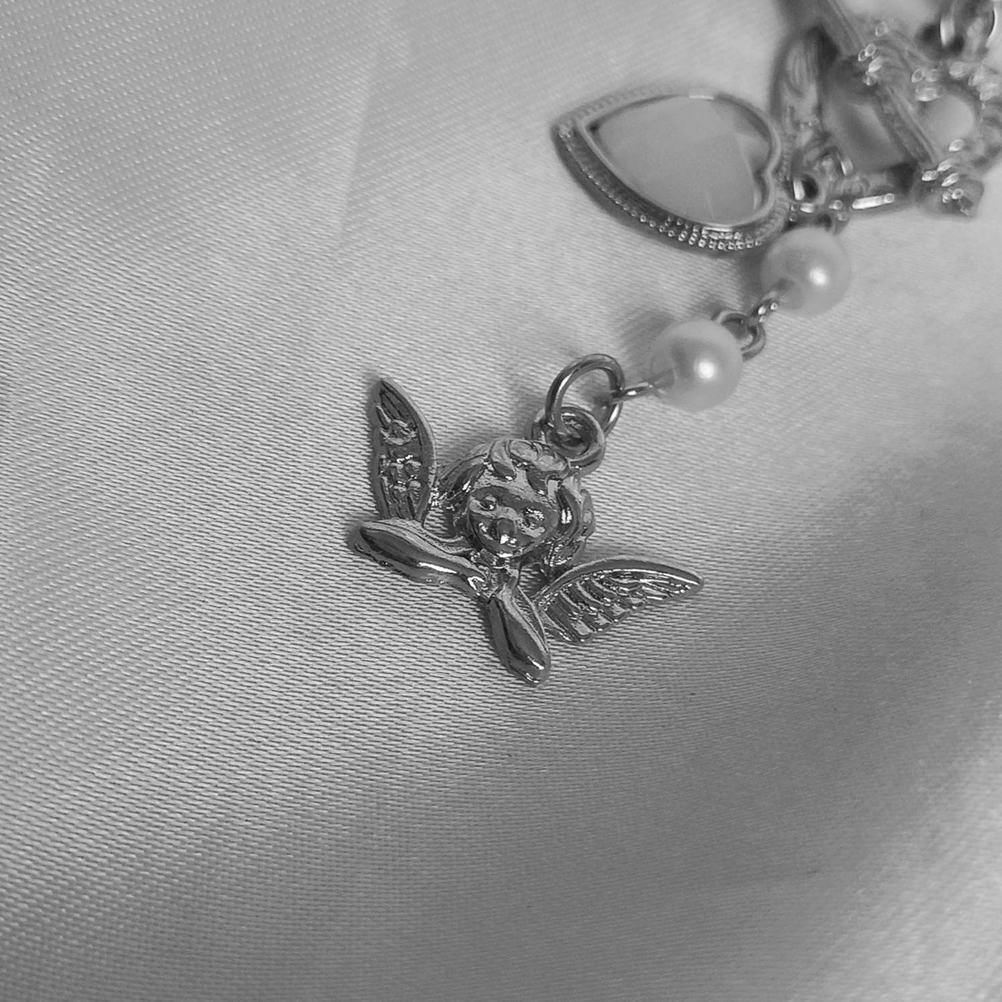 Silver Angel Charm Necklace - Silver Necklaces In The UK,Angel Necklaces,Angel Jewellery,Silver Jewellery In The UK,Silver Heart Necklace