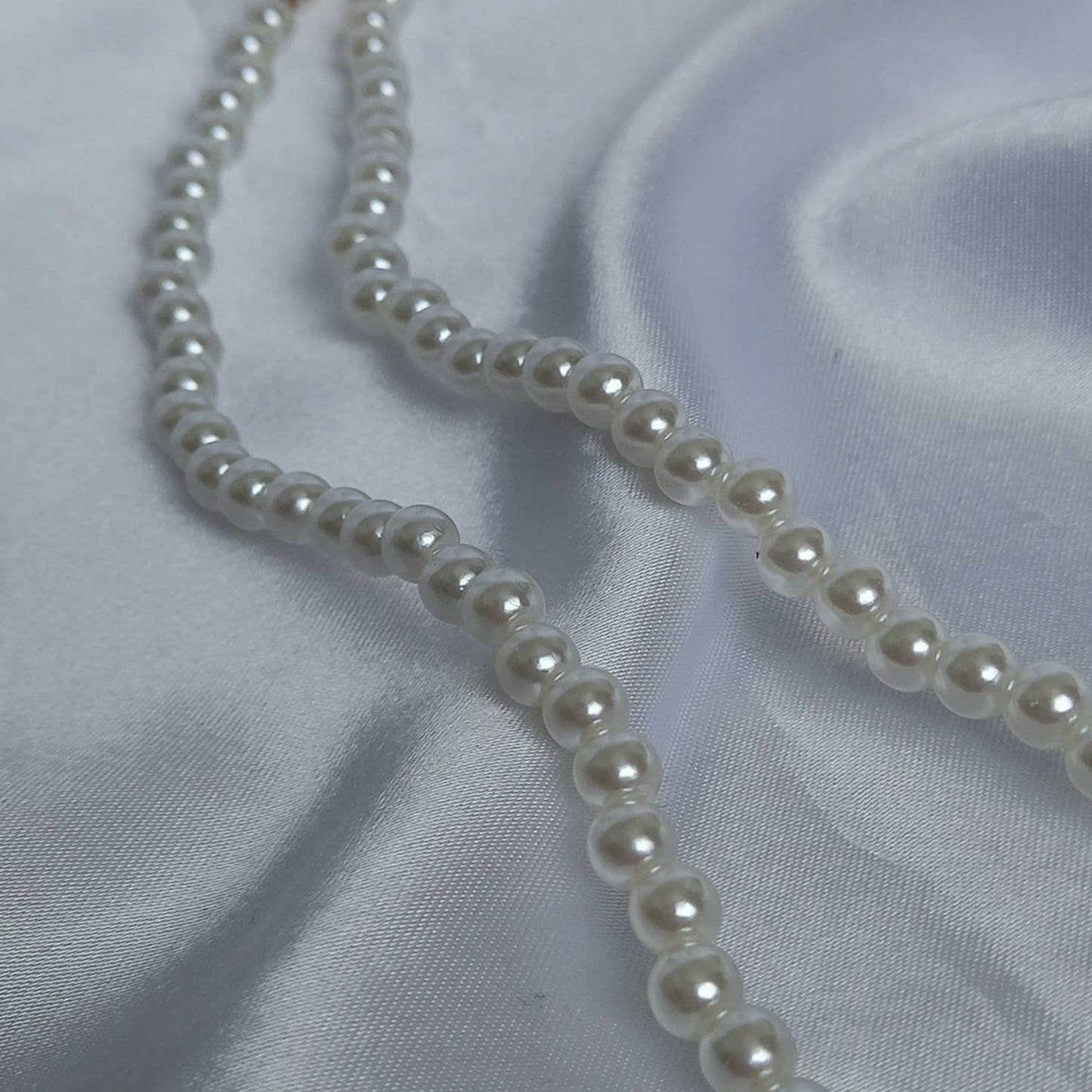 Gold Angel Charm Pearl Necklace - Faux Pearl Necklaces In The UK,Gold Angel Necklace,Angel Jewellery,Gold Jewellery In The UK,Gold Necklace